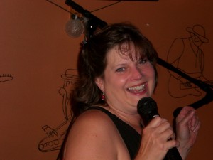 NatComedy6-28 Natalie on stage
